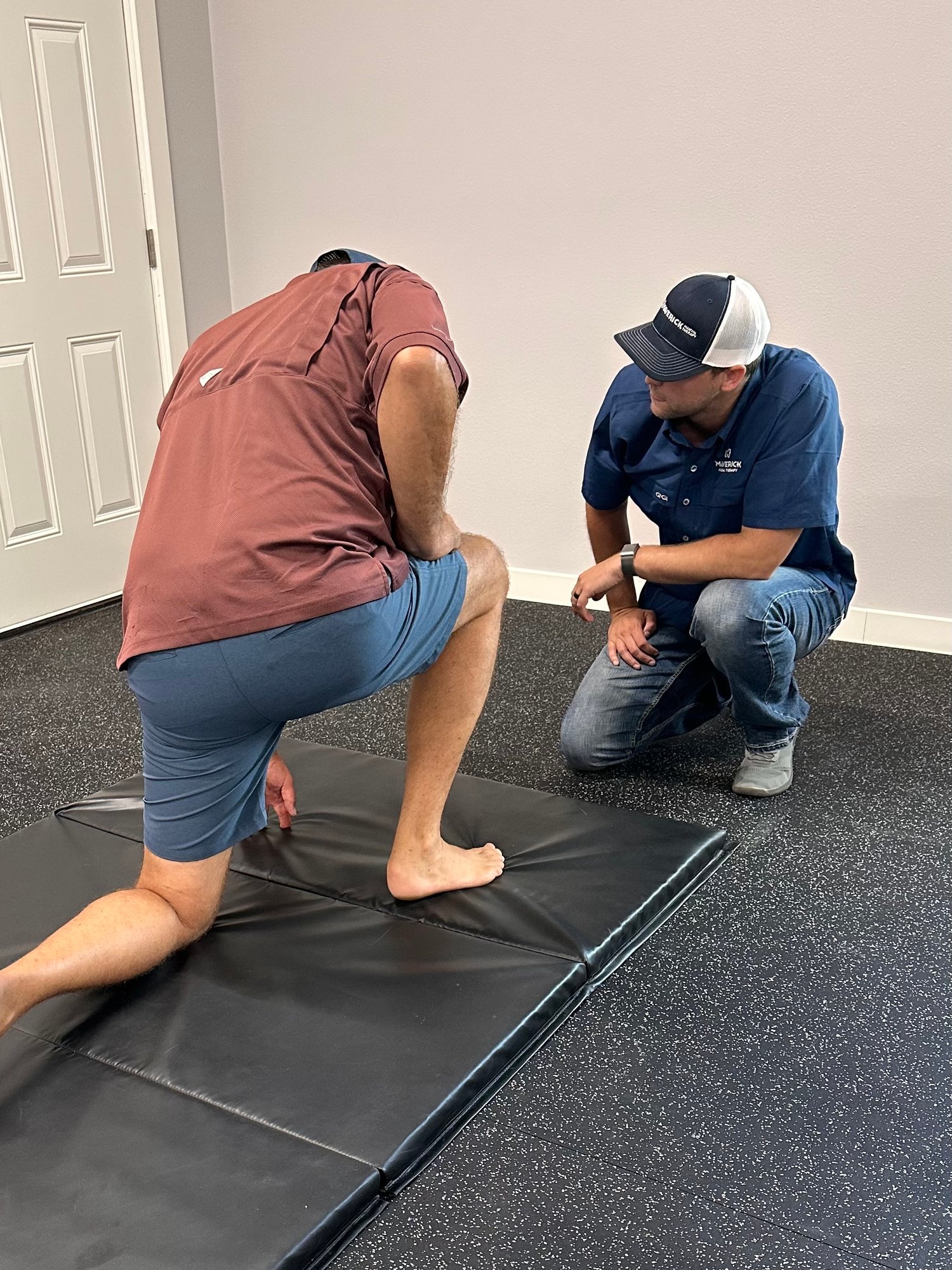 San Antonio physical therapist evaluating patient's knee pain with specialized manual therapy assessment